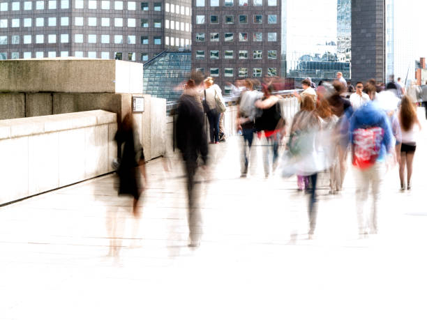 istock City workers commuters walking with movement blur, London UK 173424916