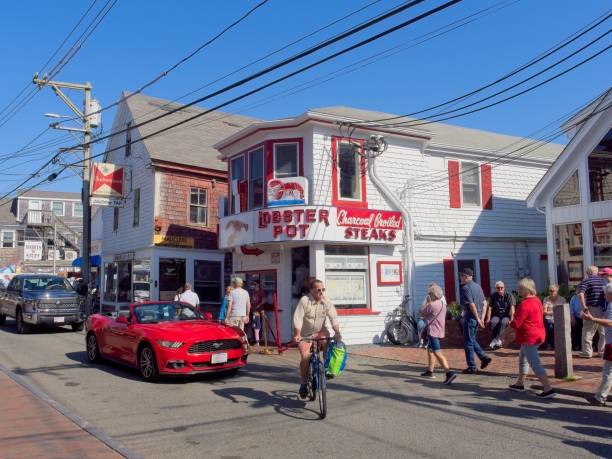 Provincetown, Cape Cod, Massachusetts - USA, October 4, 2023. Crowds gather around the world famous Lobster Pot restaurant in Provincetown, Cape Cod, Massachusetts