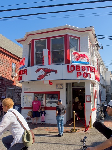 Provincetown, Cape Cod, Massachusetts - USA, October 4, 2023. Crowds gather around the world famous Lobster Pot restaurant in Provincetown, Cape Cod, Massachusetts