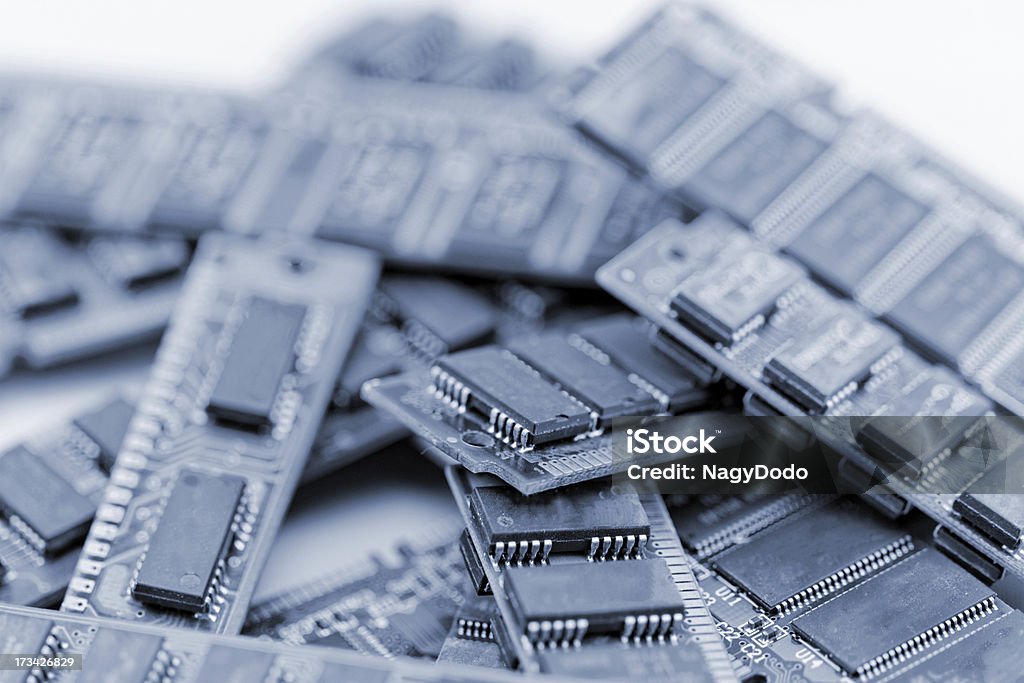 Many different computer memory modules Many different computer memory modules in blue (RAM, SD, DDR, EPROM) Abstract Stock Photo