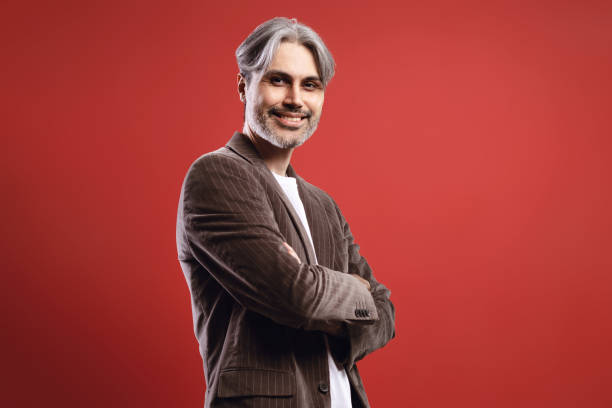 istock man with arms crossed 1734273867