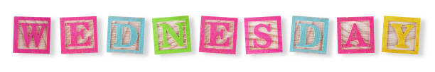 Wednesday concept with childs wood blocks with clipping path