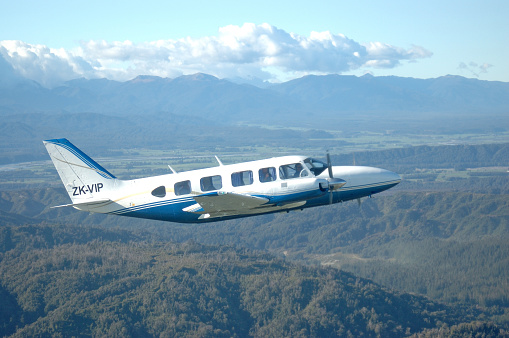 Greymouth, New Zealand, September 19, 2009: A Chieftain light aircraft flying over Westland, New Zealand