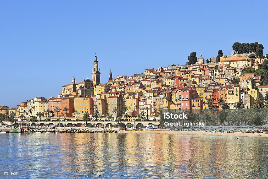 Multicolored houses of Menton, France. View on colorful houses of old town of Menton under blue sky on french riviera in Southern France. Alpes-Maritimes Stock Photo