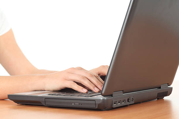 istock Beautiful woman hands typing on a laptop 173436742