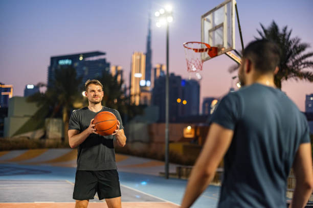 istock Multi Ethnic Friends Playing Basketball In Dubai 1734389411