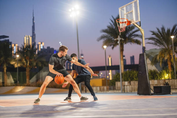 istock Friends Playing Basketball In Dubai 1734389416