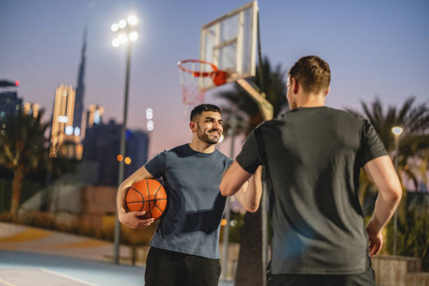 istock Multiracial Friends Playing Basketball In Dubai 1734389419
