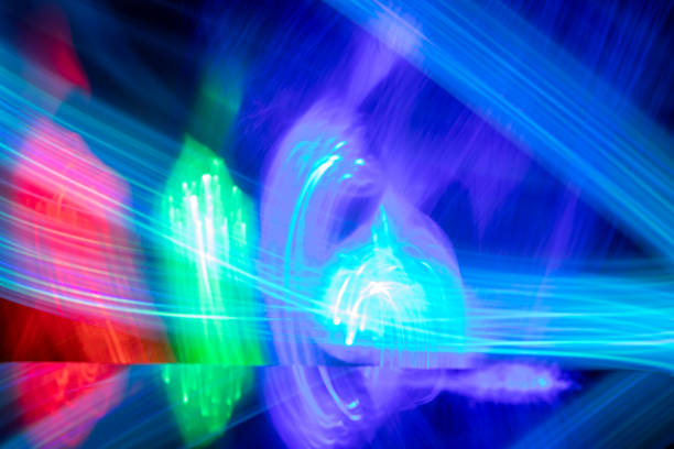 istock Abstract background with lines and colorful lights 1734438071