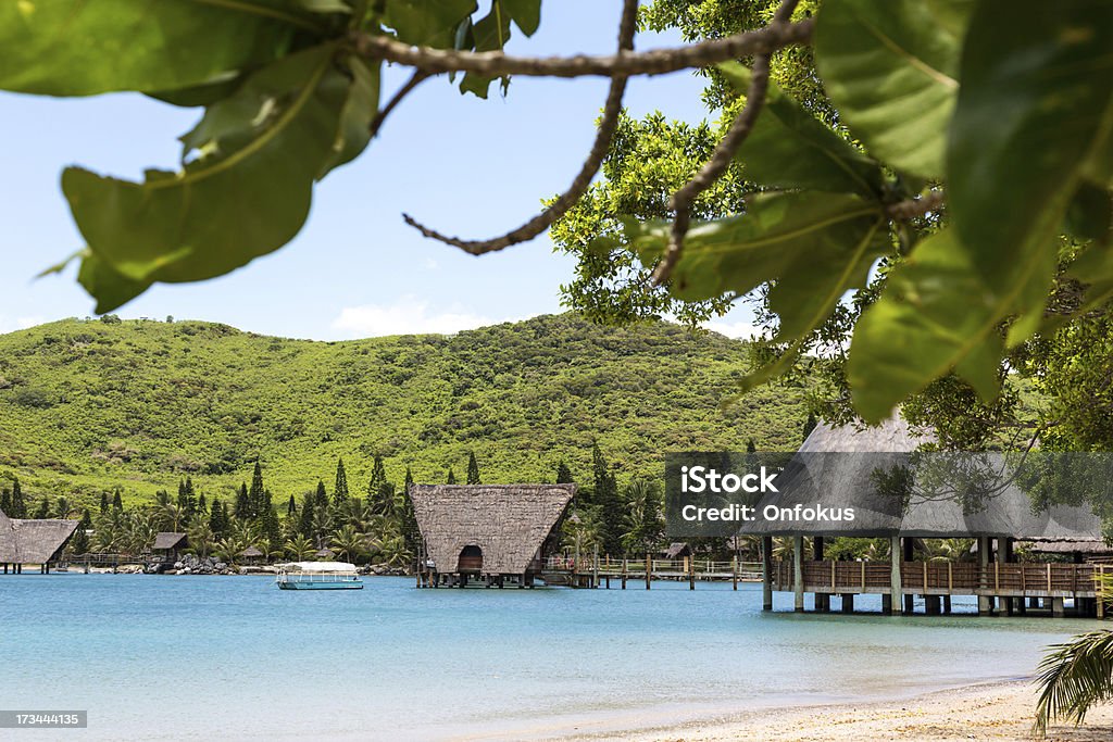 Paraíso Tropical LUJOSO Bungalow SOBRE EL AGUA Resort - Foto de stock de Nueva Caledonia libre de derechos