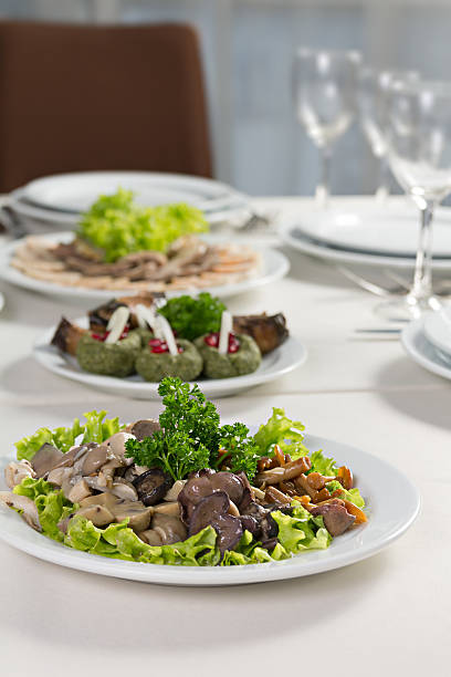 plate with mushrooms salad greens stock photo