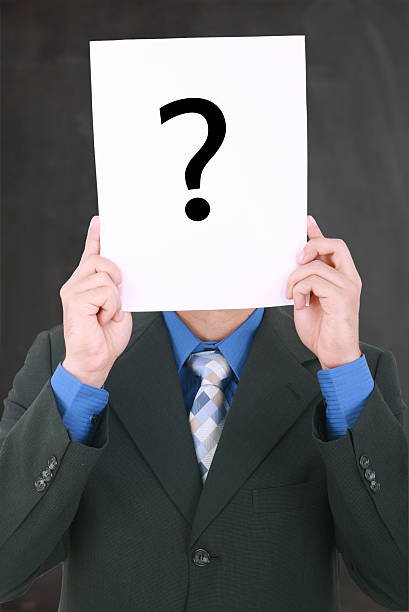 istock Young businessman holding a white billboard 173444909