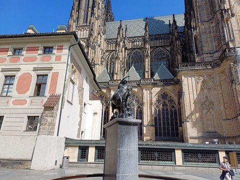 Prague, Czech - June 9, 2023: Statue of St. George and Dragon in coutyard of St. Vitus Cathedral in Prague Castle.