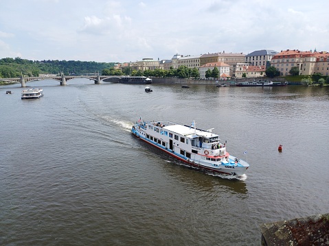 Prague, Czech Republic - June 9, 2023: Cruise ships carry tourists to enjoy sightseeing on the Vltava River
