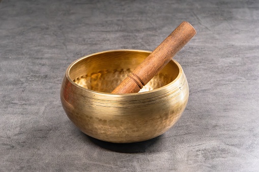 A tool of spirituality for therapy and healing of the aura and soul. Tibetan Buddhist bowl for mantras and relaxation.