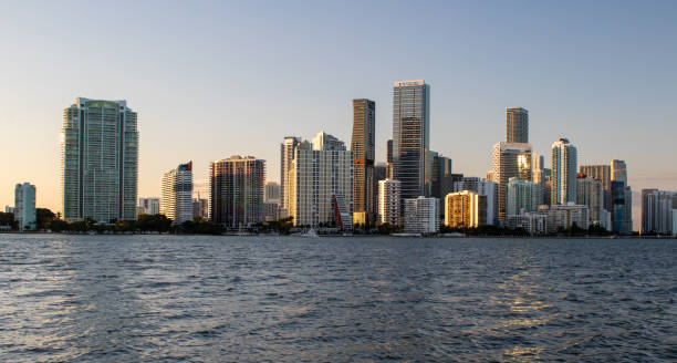 istock Brickell, Miami, Florida, city skyline, sunset 1734612945