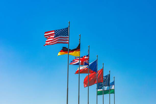 istock National flags on flagpoles of various states 1734632461