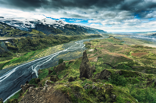 Dramatic landscape of viewpoint Valahnukur with lush volcanic mountain and moody sky in Icelandic highlands on summer at Thorsmork, Iceland