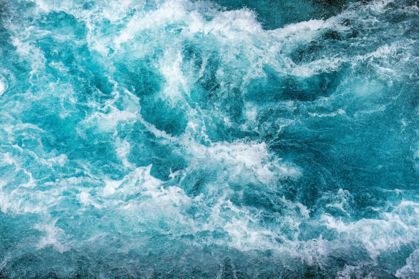 istock Natural texture crystal blue water rapids sea with air bubbles flowing motion 1734701078