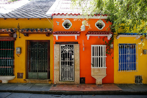 Colorful house facades in the Gethsemane neighborhood of Cartagena on a sunny day, Colombia