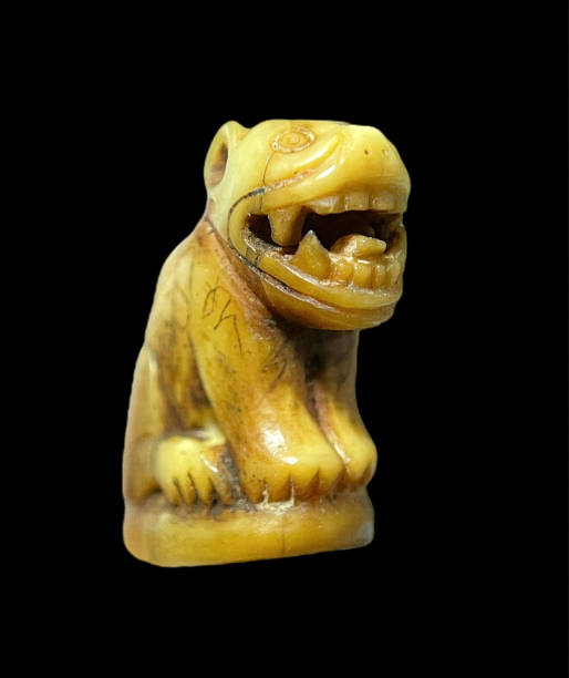 istock carved tiger fang 1734726241