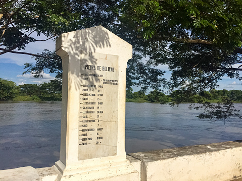 Piedra de Bolivar (memorial stone of Bolivar) at the river in sunlight, Santa Cruz de Mompox, Colombia, World Heritage
