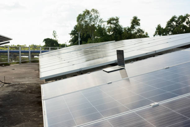 istock Engineer uses laptop computer to inspect solar panels, solar cell farm Concept of economic energy and cost saving 1734792921