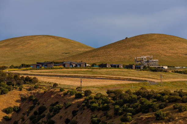 istock Houses and green hill 1734800459