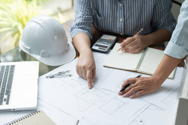 istock Architecture drawing on architectural Creative project business architecture building constructionÂ Industrial engineering Achievement Planning Design on blueprint Teamwork 1734829990