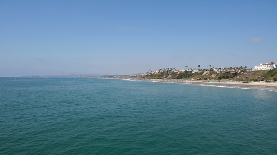 The beach next to the San Clemente Pier in Orange County, California, USA.