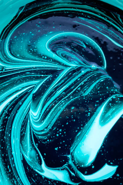 istock Abstraction in white and blue. Beautiful patterns in white and blue paint. Patterns when mixing paint. white streaks in blue paint. 1734873220