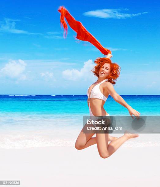 Woman Jumping On The Beach Stock Photo - Download Image Now - Activity, Adult, Beach
