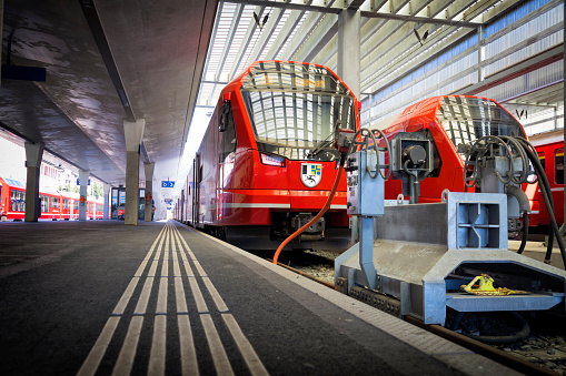Holidays in Switzerland -  Sankt Moritz railway station with RhB trains