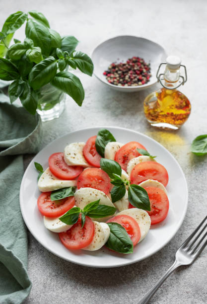 istock Caprese salad with tomatoes, mozzarella and basil. 1734912748