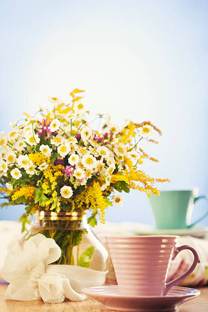 istock Tea for two and summer flowers 173494293