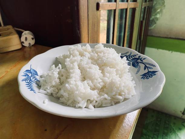 istock white rice on white glass plate 1734944762