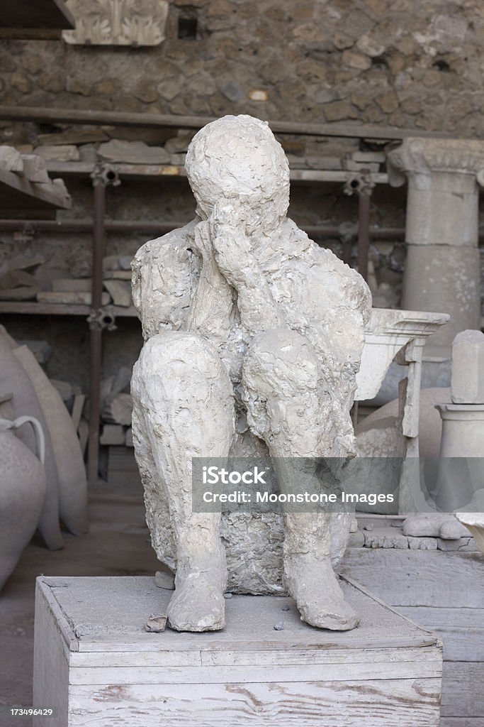 Pompeii in Naples, Italy A figure frozen in time, this is a resident of Pompeii, killed by the ash of the volcanic eruption of AD79 Ancient Stock Photo