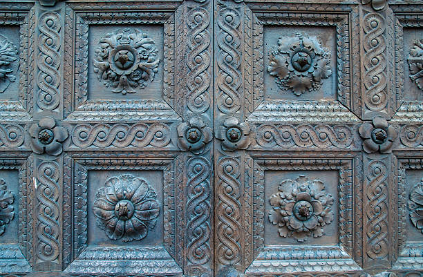 istock Old door with wooden decorations 173496460