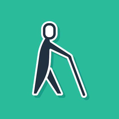 Blue Blind human holding stick icon isolated on green background. Disabled human with blindness. Vector.