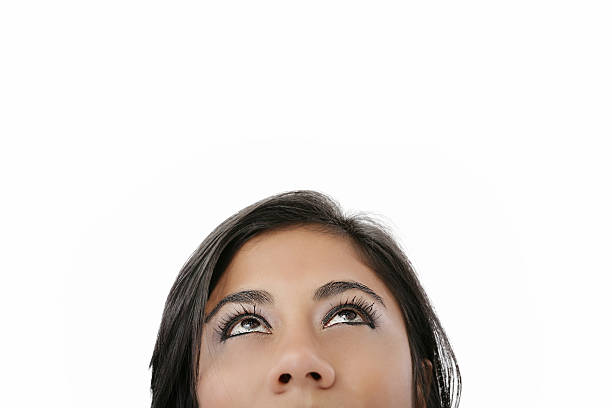 istock Young woman looking up 173498274