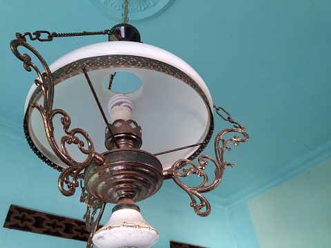 Antique hanging lamp with modern modifications