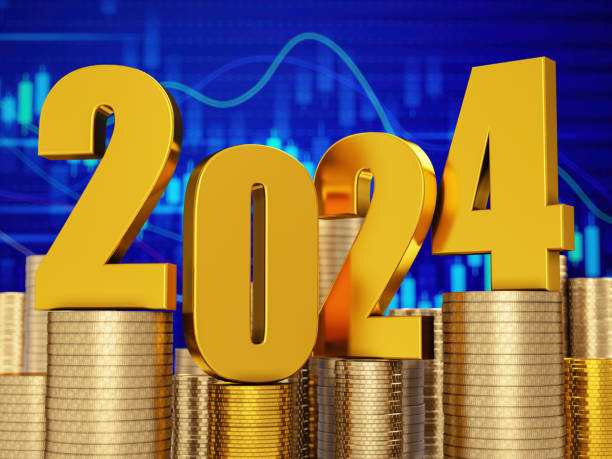 istock 2024 Numbers Sitting Over Coin Stacks with a Financial Chart 1734997191