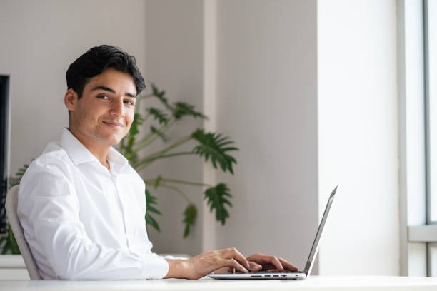 istock a young person engaged in online trading on a computer 1735004823