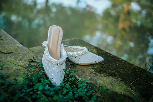 bridal sandals by the river