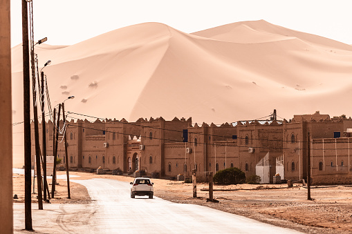 View of Merzouga and sand dunes, gateway to Sahara Desert, Merzouga, Morocco . High quality photo
