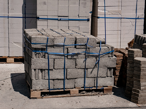 bricks stacked on pallets ready to be lifted and shipped