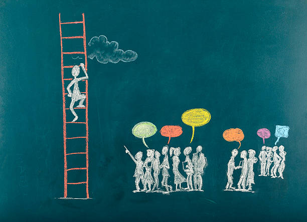 istock Stick Figure Climbing Ladder To Success 173503342