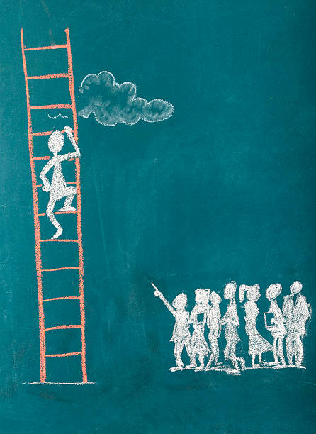 istock Stick Figure Climbing Ladder To Success 173503965