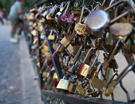 Paris, France, 25.08.2023 padlocks on fence near the Basilica of the Sacred Heart of Paris