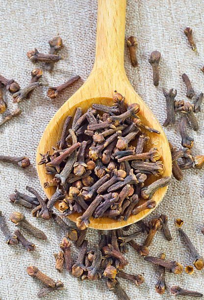 istock clove in wooden spoon 173506765